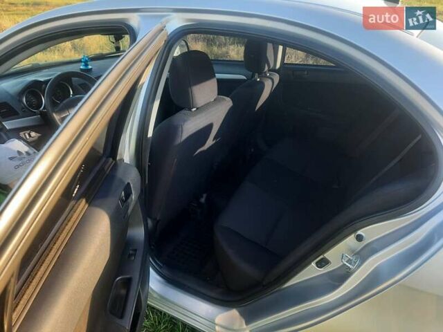 Сірий Міцубісі Lancer, об'ємом двигуна 1.5 л та пробігом 170 тис. км за 6200 $, фото 13 на Automoto.ua