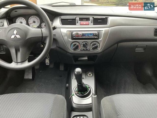 Сірий Міцубісі Lancer, об'ємом двигуна 1.59 л та пробігом 44 тис. км за 6200 $, фото 19 на Automoto.ua