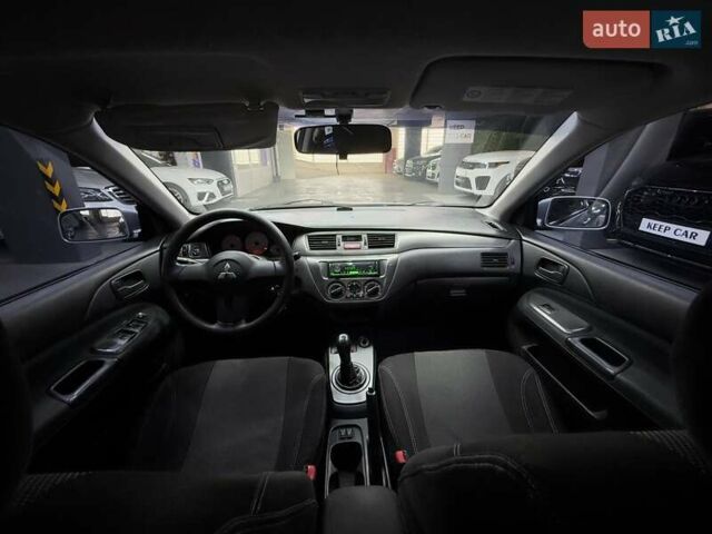 Серый Мицубиси Лансер, объемом двигателя 1.58 л и пробегом 271 тыс. км за 4200 $, фото 28 на Automoto.ua