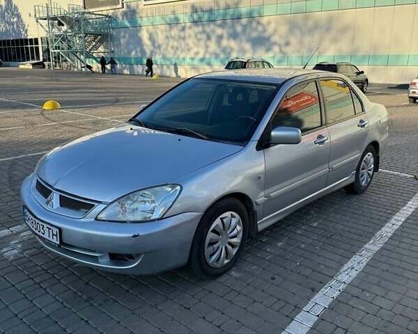 Сірий Міцубісі Lancer, об'ємом двигуна 1.6 л та пробігом 174 тис. км за 4800 $, фото 6 на Automoto.ua