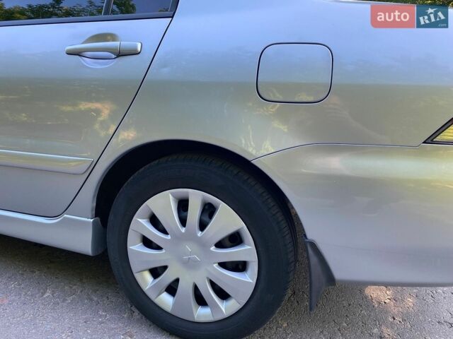 Сірий Міцубісі Lancer, об'ємом двигуна 1.6 л та пробігом 193 тис. км за 5400 $, фото 19 на Automoto.ua