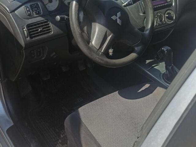 Сірий Міцубісі Lancer, об'ємом двигуна 1.6 л та пробігом 274 тис. км за 3200 $, фото 6 на Automoto.ua