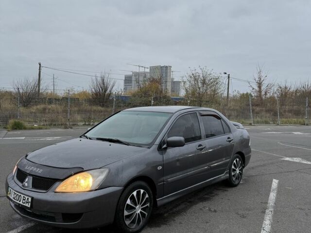 Серый Мицубиси Лансер, объемом двигателя 1.6 л и пробегом 350 тыс. км за 2850 $, фото 5 на Automoto.ua