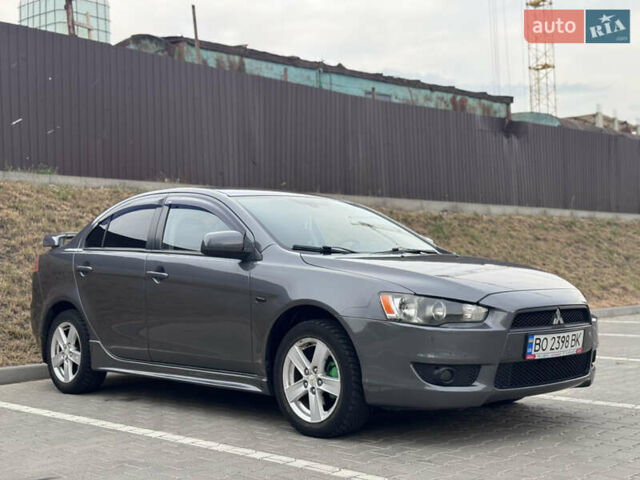 Сірий Міцубісі Lancer, об'ємом двигуна 2 л та пробігом 222 тис. км за 6300 $, фото 3 на Automoto.ua