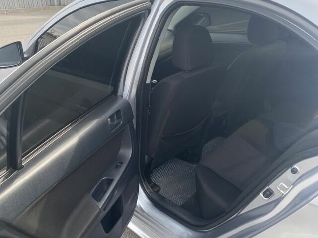 Серый Мицубиси Лансер, объемом двигателя 1.5 л и пробегом 188 тыс. км за 4999 $, фото 6 на Automoto.ua