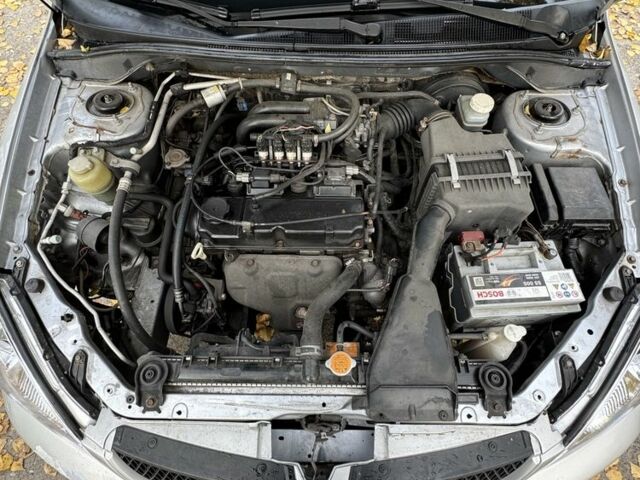 Сірий Міцубісі Lancer, об'ємом двигуна 1.6 л та пробігом 180 тис. км за 2500 $, фото 7 на Automoto.ua