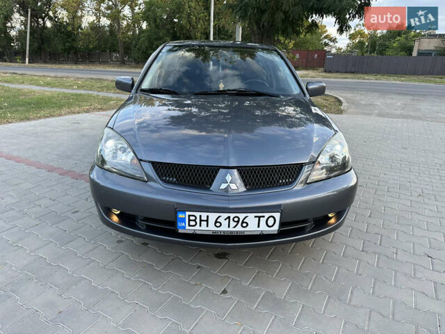 Сірий Міцубісі Lancer, об'ємом двигуна 1.6 л та пробігом 189 тис. км за 6200 $, фото 7 на Automoto.ua