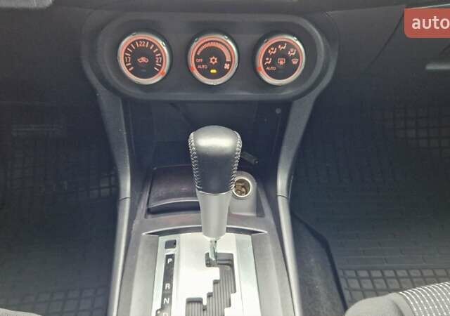 Серый Мицубиси Лансер, объемом двигателя 2 л и пробегом 213 тыс. км за 6550 $, фото 22 на Automoto.ua