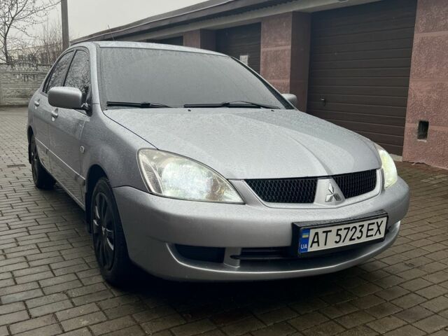 Сірий Міцубісі Lancer, об'ємом двигуна 1.6 л та пробігом 272 тис. км за 4500 $, фото 8 на Automoto.ua