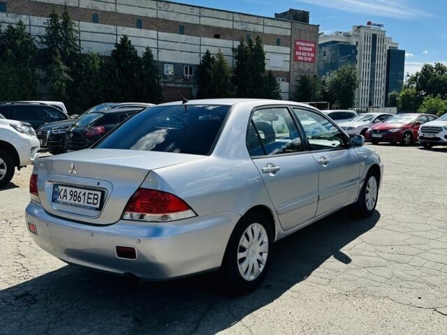 Сірий Міцубісі Lancer, об'ємом двигуна 1.6 л та пробігом 269 тис. км за 4700 $, фото 2 на Automoto.ua