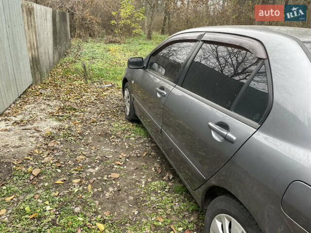 Серый Мицубиси Лансер, объемом двигателя 1.58 л и пробегом 290 тыс. км за 3500 $, фото 2 на Automoto.ua