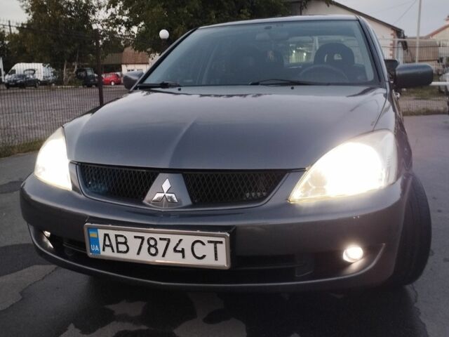 Сірий Міцубісі Lancer, об'ємом двигуна 1.6 л та пробігом 178 тис. км за 5464 $, фото 11 на Automoto.ua