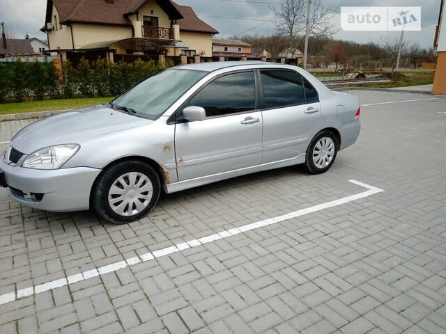 Сірий Міцубісі Lancer, об'ємом двигуна 1.6 л та пробігом 270 тис. км за 3750 $, фото 4 на Automoto.ua