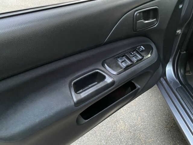 Серый Мицубиси Лансер, объемом двигателя 1.6 л и пробегом 250 тыс. км за 3999 $, фото 9 на Automoto.ua