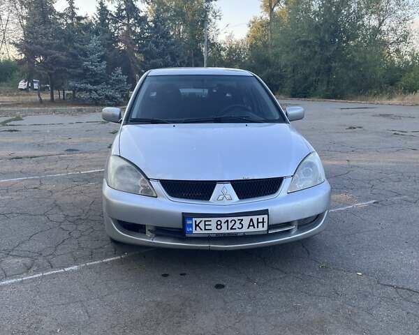 Серый Мицубиси Лансер, объемом двигателя 1.6 л и пробегом 300 тыс. км за 3799 $, фото 8 на Automoto.ua