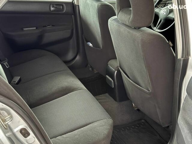 Серый Мицубиси Лансер, объемом двигателя 1.6 л и пробегом 174 тыс. км за 5990 $, фото 10 на Automoto.ua