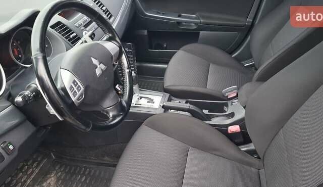 Серый Мицубиси Лансер, объемом двигателя 2 л и пробегом 189 тыс. км за 6800 $, фото 12 на Automoto.ua