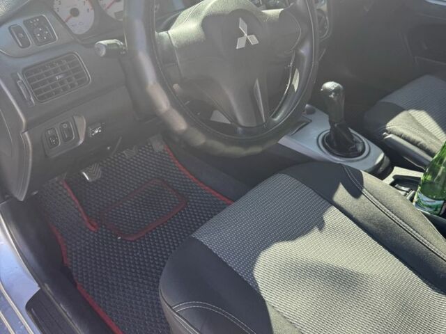 Серый Мицубиси Лансер, объемом двигателя 1.6 л и пробегом 265 тыс. км за 4100 $, фото 10 на Automoto.ua