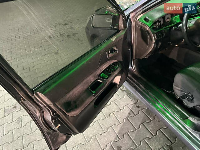 Серый Мицубиси Лансер, объемом двигателя 1.6 л и пробегом 112 тыс. км за 2800 $, фото 13 на Automoto.ua