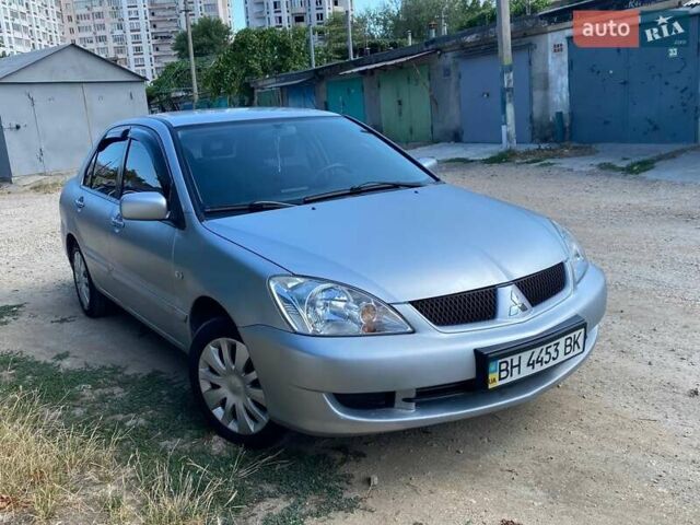 Сірий Міцубісі Lancer, об'ємом двигуна 1.6 л та пробігом 381 тис. км за 3350 $, фото 3 на Automoto.ua
