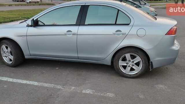 Серый Мицубиси Лансер, объемом двигателя 1.5 л и пробегом 201 тыс. км за 5600 $, фото 2 на Automoto.ua