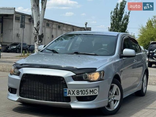Сірий Міцубісі Lancer, об'ємом двигуна 2 л та пробігом 149 тис. км за 6798 $, фото 17 на Automoto.ua