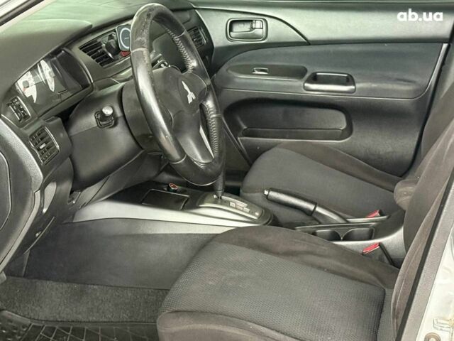 Серый Мицубиси Лансер, объемом двигателя 1.6 л и пробегом 174 тыс. км за 5990 $, фото 8 на Automoto.ua