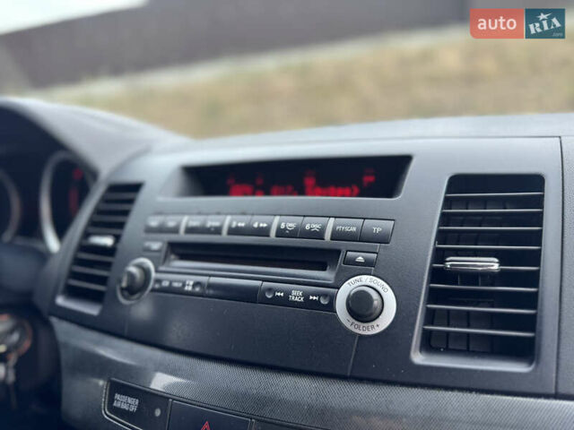 Сірий Міцубісі Lancer, об'ємом двигуна 2 л та пробігом 222 тис. км за 6300 $, фото 24 на Automoto.ua