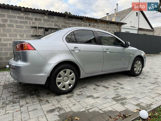 Міцубісі Lancer 2007 у Житомирі на Automoto.ua Сірий Міцубісі Lancer, об'ємом двигуна 1.5 л та пробігом 195 тис. км за 5700 $, фото 12 на Automoto.ua
