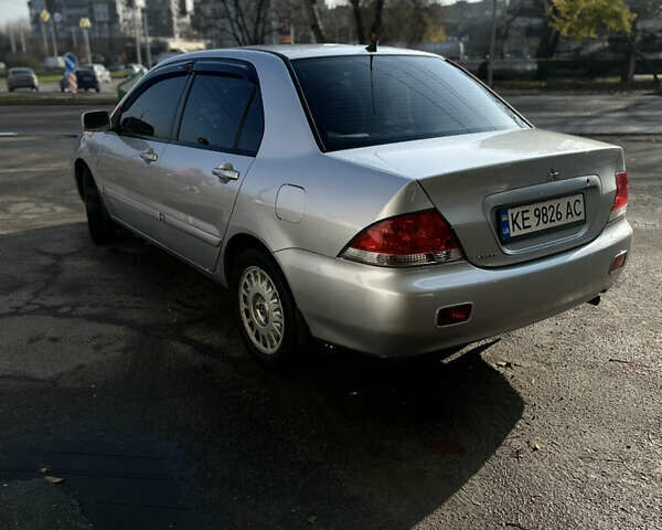 Сірий Міцубісі Lancer, об'ємом двигуна 1.6 л та пробігом 249 тис. км за 5100 $, фото 2 на Automoto.ua