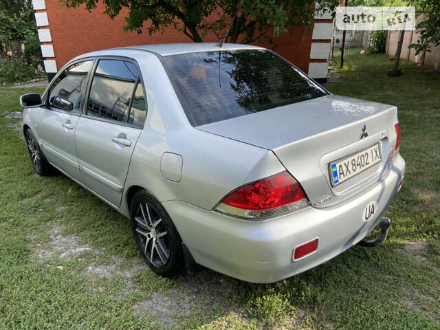 Сірий Міцубісі Lancer, об'ємом двигуна 1.6 л та пробігом 250 тис. км за 5500 $, фото 3 на Automoto.ua