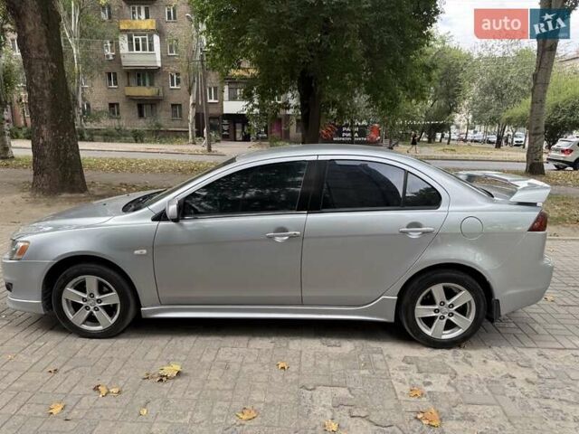 Серый Мицубиси Лансер, объемом двигателя 2 л и пробегом 187 тыс. км за 5950 $, фото 11 на Automoto.ua
