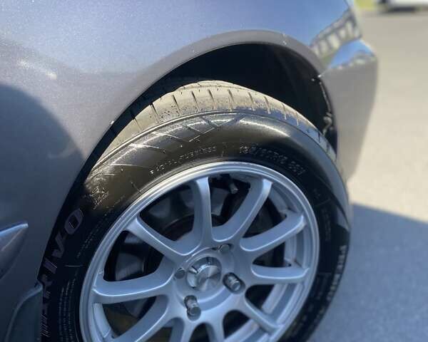 Сірий Міцубісі Lancer, об'ємом двигуна 1.6 л та пробігом 293 тис. км за 5000 $, фото 12 на Automoto.ua