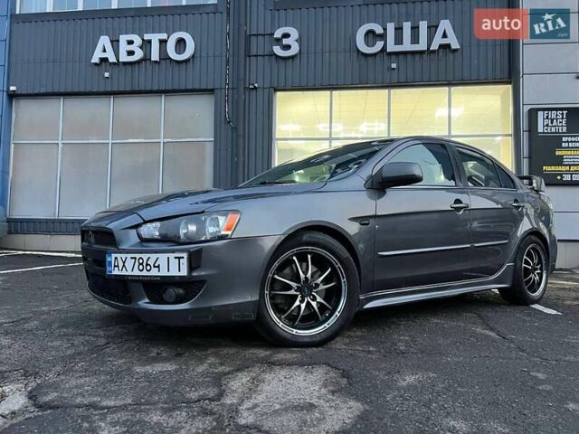 Серый Мицубиси Лансер, объемом двигателя 2 л и пробегом 170 тыс. км за 6999 $, фото 3 на Automoto.ua