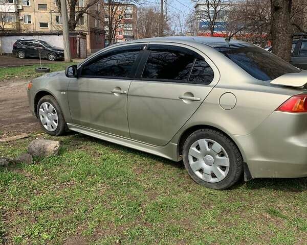 Сірий Міцубісі Lancer, об'ємом двигуна 1.5 л та пробігом 196 тис. км за 5600 $, фото 2 на Automoto.ua