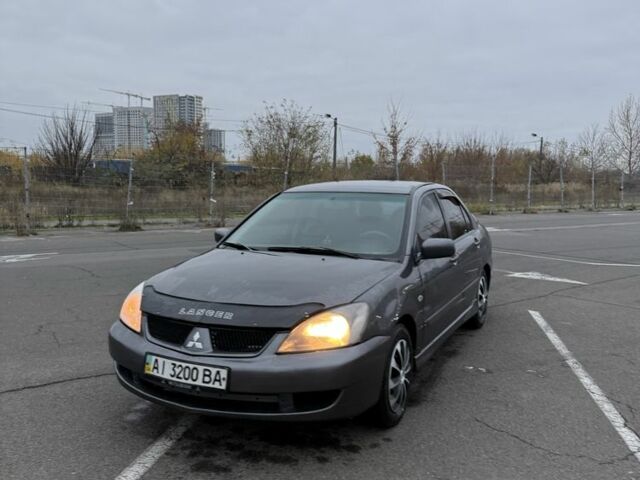 Серый Мицубиси Лансер, объемом двигателя 1.6 л и пробегом 350 тыс. км за 2850 $, фото 10 на Automoto.ua