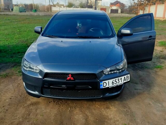 Серый Мицубиси Лансер, объемом двигателя 2 л и пробегом 351 тыс. км за 7000 $, фото 1 на Automoto.ua