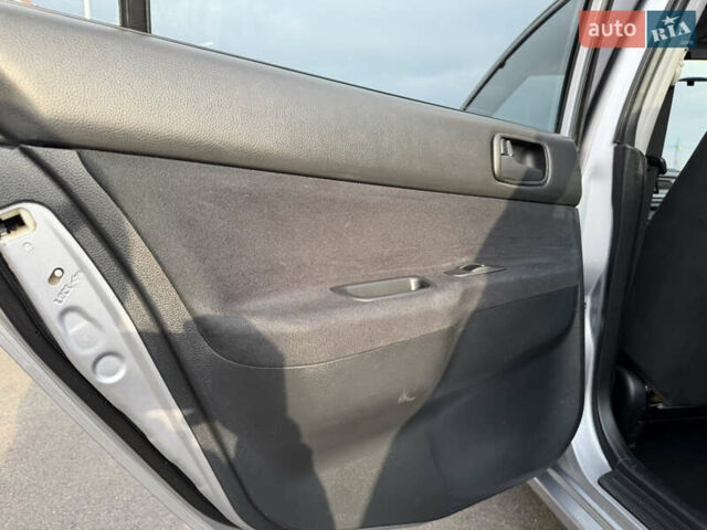 Серый Мицубиси Лансер, объемом двигателя 1.3 л и пробегом 160 тыс. км за 5555 $, фото 53 на Automoto.ua