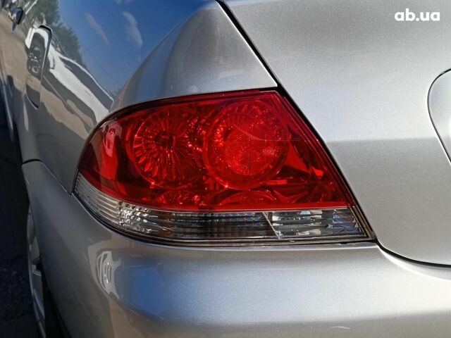 Сірий Міцубісі Lancer, об'ємом двигуна 1.6 л та пробігом 222 тис. км за 3990 $, фото 10 на Automoto.ua