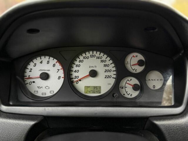 Сірий Міцубісі Lancer, об'ємом двигуна 1.6 л та пробігом 247 тис. км за 4900 $, фото 6 на Automoto.ua