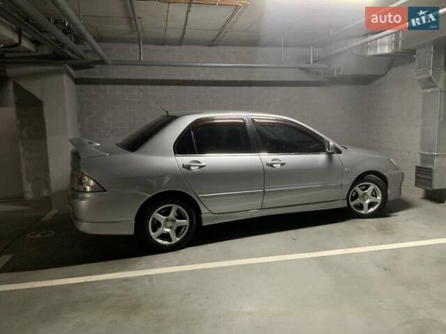 Серый Мицубиси Лансер, объемом двигателя 1.6 л и пробегом 196 тыс. км за 3800 $, фото 3 на Automoto.ua