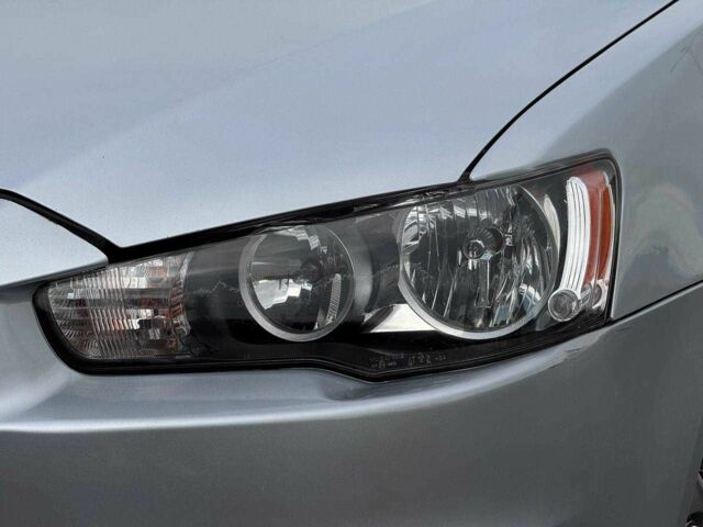 Серый Мицубиси Лансер, объемом двигателя 2 л и пробегом 207 тыс. км за 5800 $, фото 5 на Automoto.ua