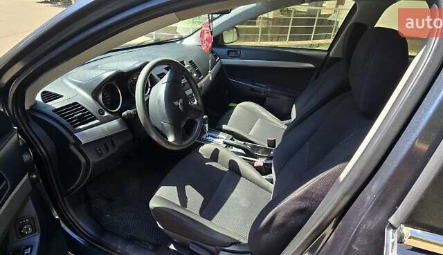 Сірий Міцубісі Lancer, об'ємом двигуна 1.5 л та пробігом 211 тис. км за 5600 $, фото 6 на Automoto.ua