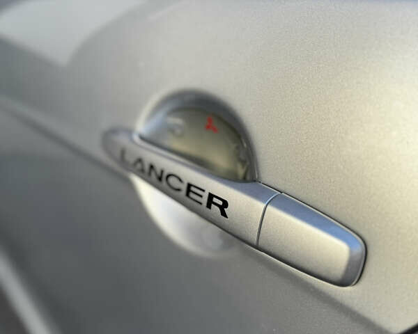 Сірий Міцубісі Lancer, об'ємом двигуна 2 л та пробігом 173 тис. км за 6800 $, фото 14 на Automoto.ua