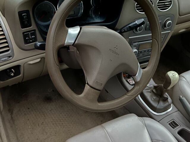 Серый Мицубиси Лансер, объемом двигателя 1.6 л и пробегом 180 тыс. км за 1300 $, фото 2 на Automoto.ua