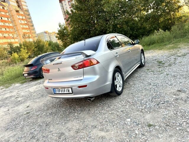 Сірий Міцубісі Lancer, об'ємом двигуна 2 л та пробігом 223 тис. км за 6890 $, фото 5 на Automoto.ua