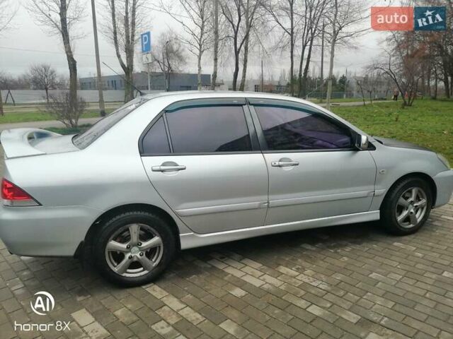 Сірий Міцубісі Lancer, об'ємом двигуна 1.6 л та пробігом 225 тис. км за 5200 $, фото 1 на Automoto.ua
