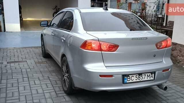 Серый Мицубиси Лансер, объемом двигателя 1.5 л и пробегом 230 тыс. км за 6300 $, фото 2 на Automoto.ua