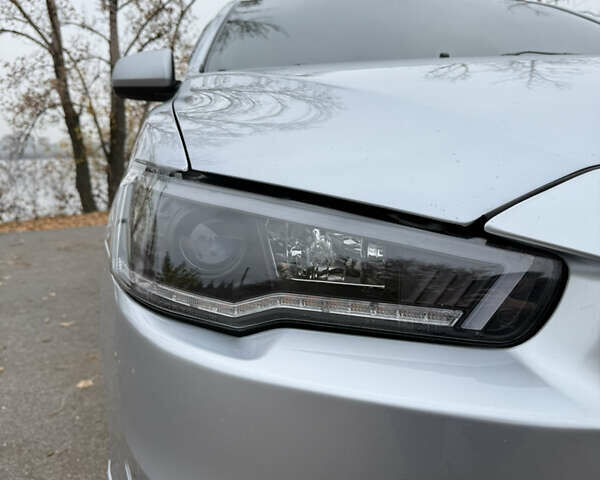 Сірий Міцубісі Lancer, об'ємом двигуна 2 л та пробігом 253 тис. км за 8700 $, фото 12 на Automoto.ua