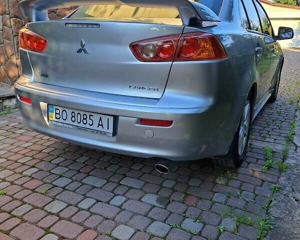 Сірий Міцубісі Lancer, об'ємом двигуна 2 л та пробігом 207 тис. км за 6550 $, фото 3 на Automoto.ua